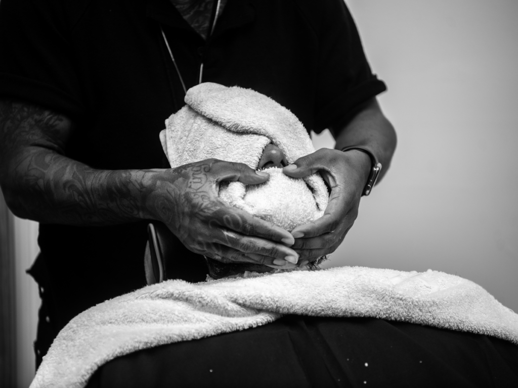 hot towel on a beard trim shaving experience 